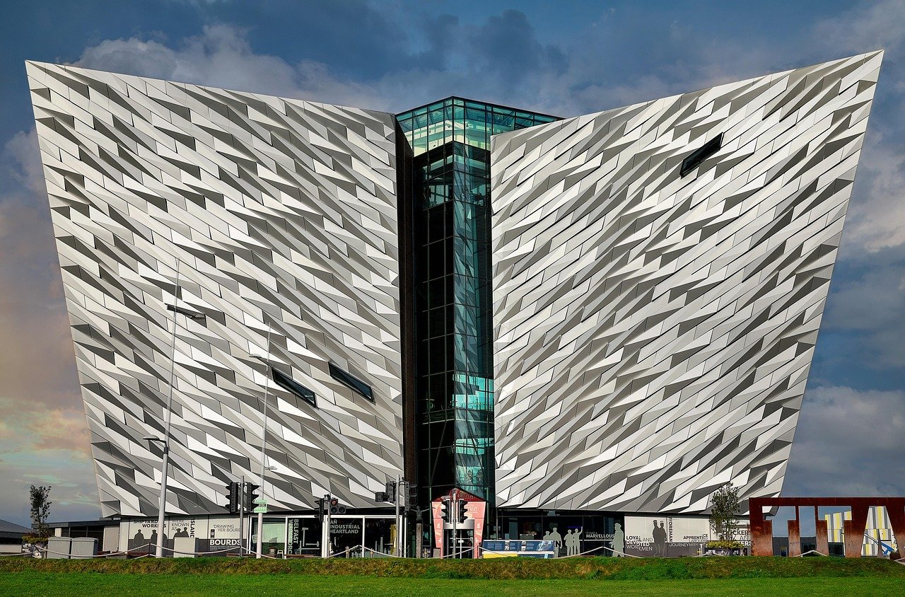 The silver hull-shaped facade of the Titanic Belfast building