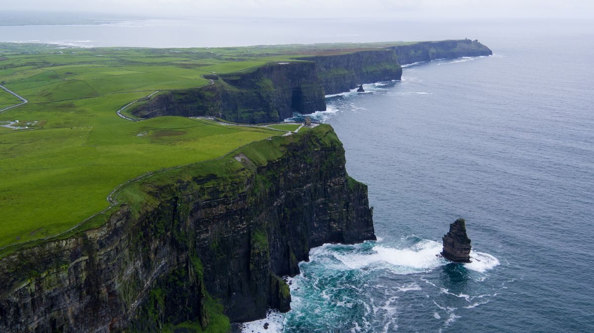 Aerial view of the Cliffs of Moher with a sea stack off the headland