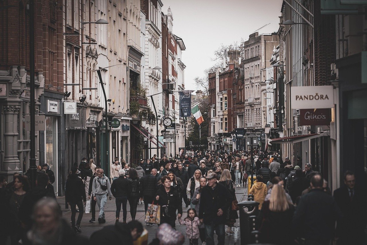Crowds walking down a busy Grafton Street in Dublin