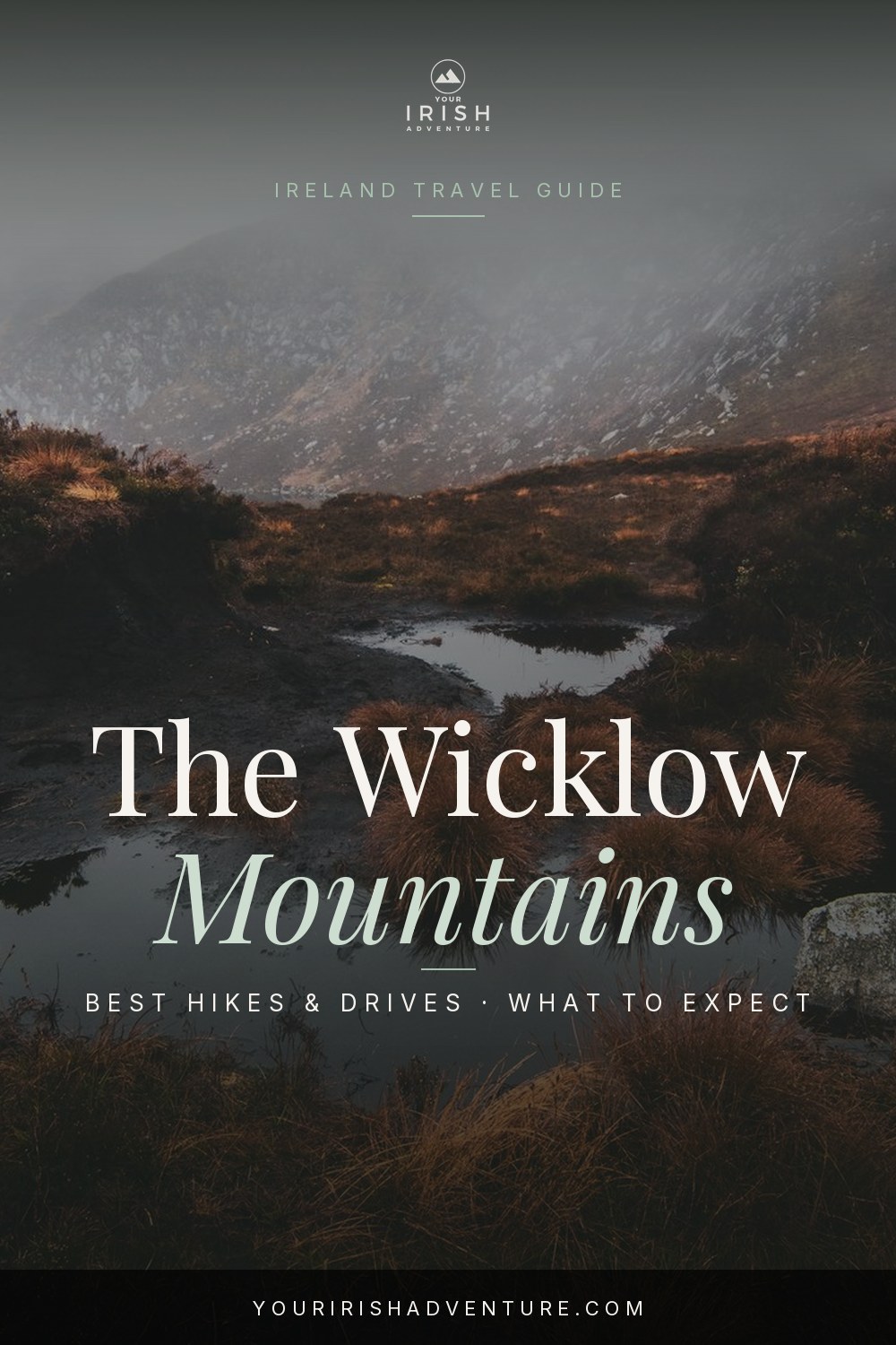 Green valley and lake in the Wicklow Mountains National Park in Ireland with a walking trail