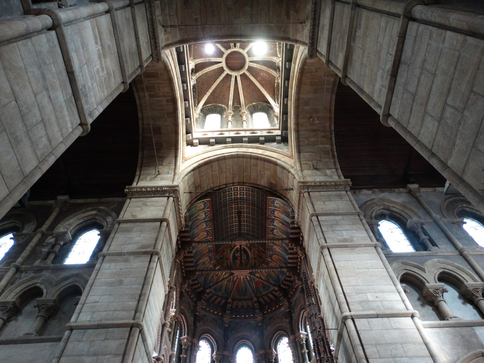 Stone arches and decorated ceiling inside Saint Fin Barre's Cathedral in Cork