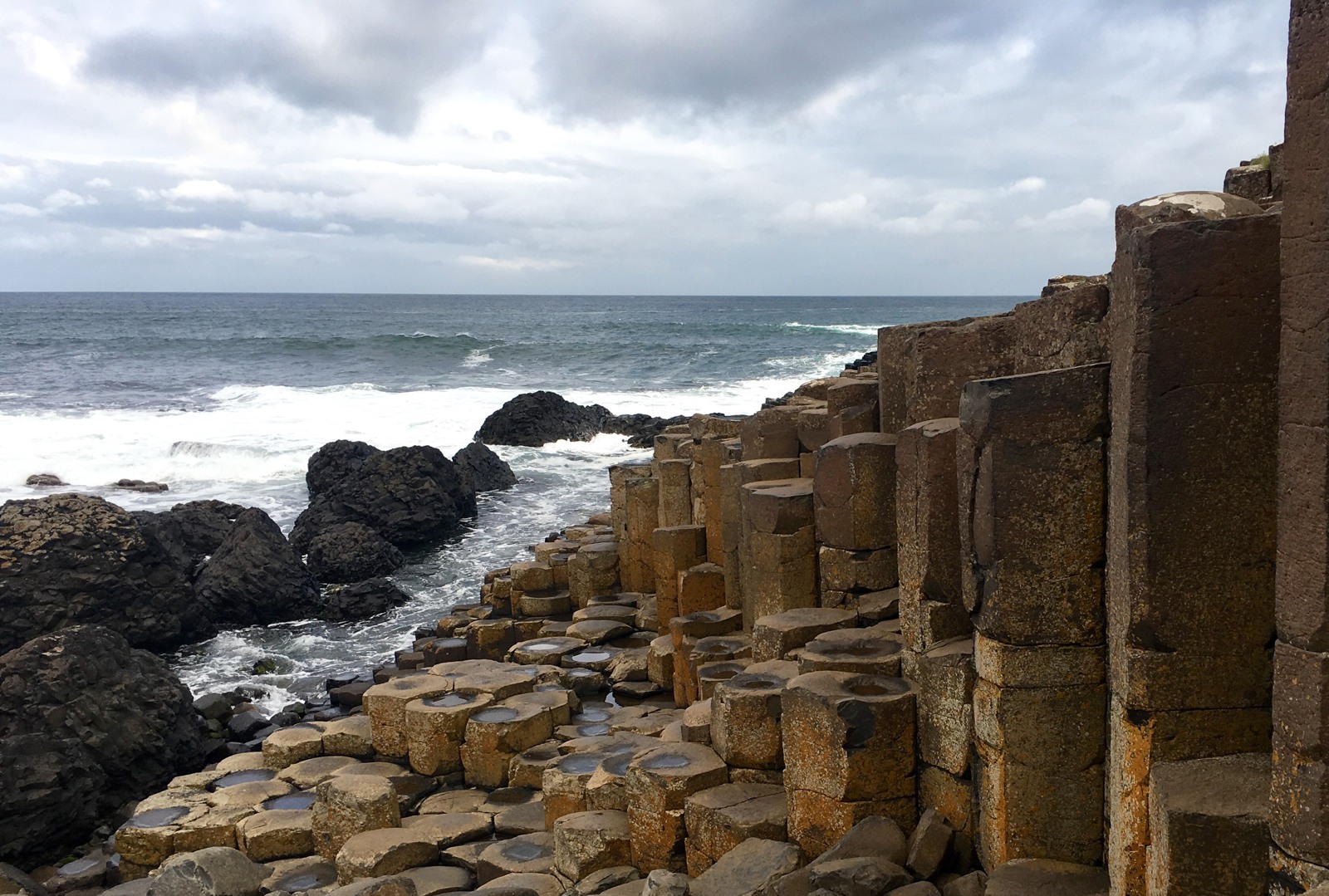 Uneven basalt columns beside the sea at the Giant's Causeway