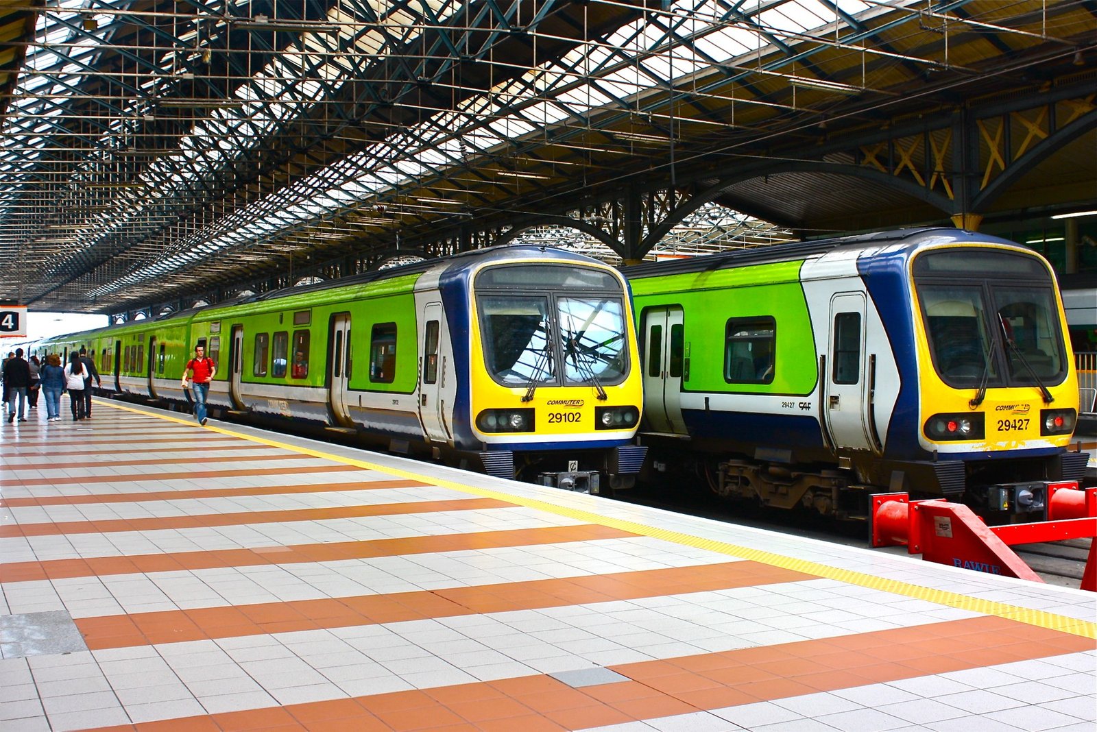 Two DART trains beside a platform at Connolly Station