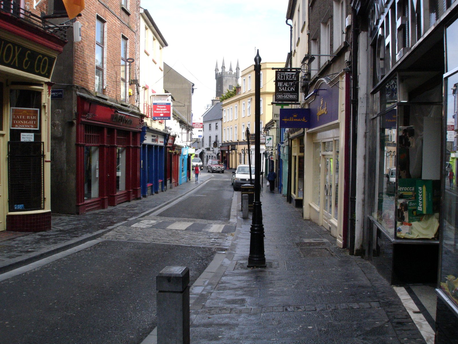 Street through central Ennis with colorful shopfronts