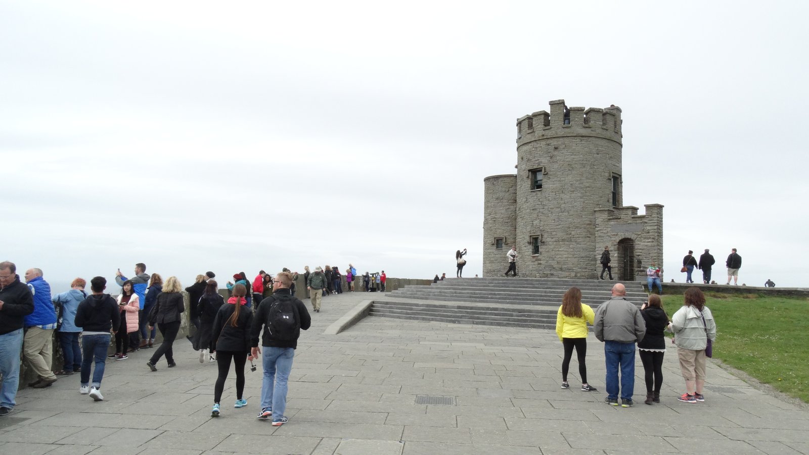Visitors near O’Brien’s Tower at the Cliffs of Moher