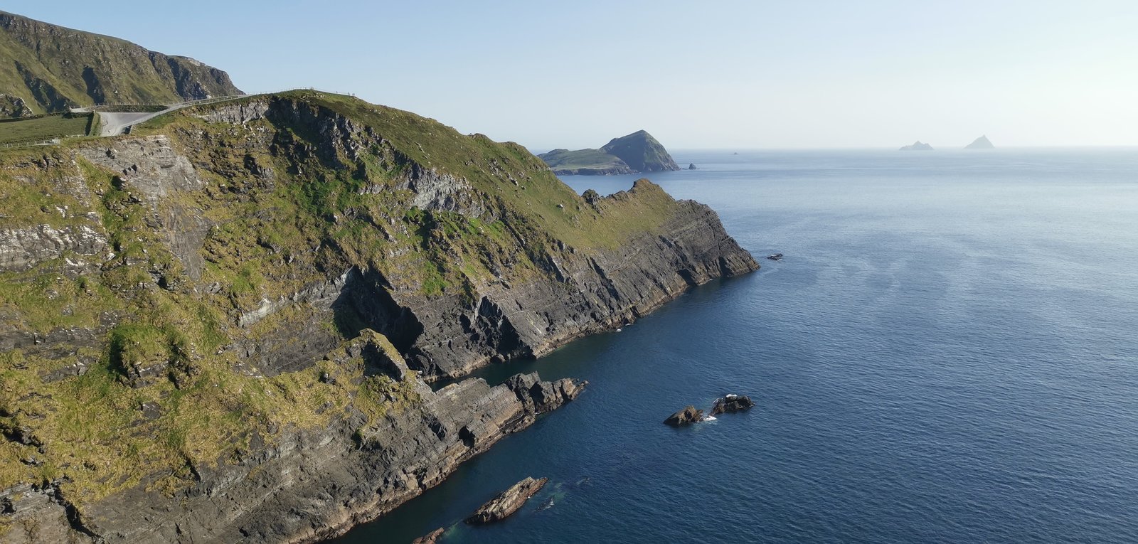 Layered rock cliffs above the Atlantic at the Kerry Cliffs
