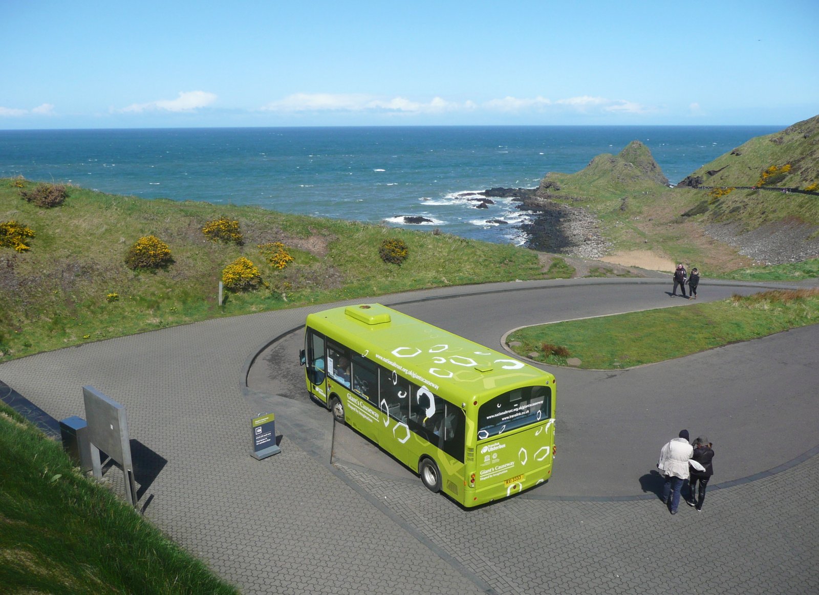 The green Translink shuttle bus at the Giant's Causeway Visitor Centre turning circle
