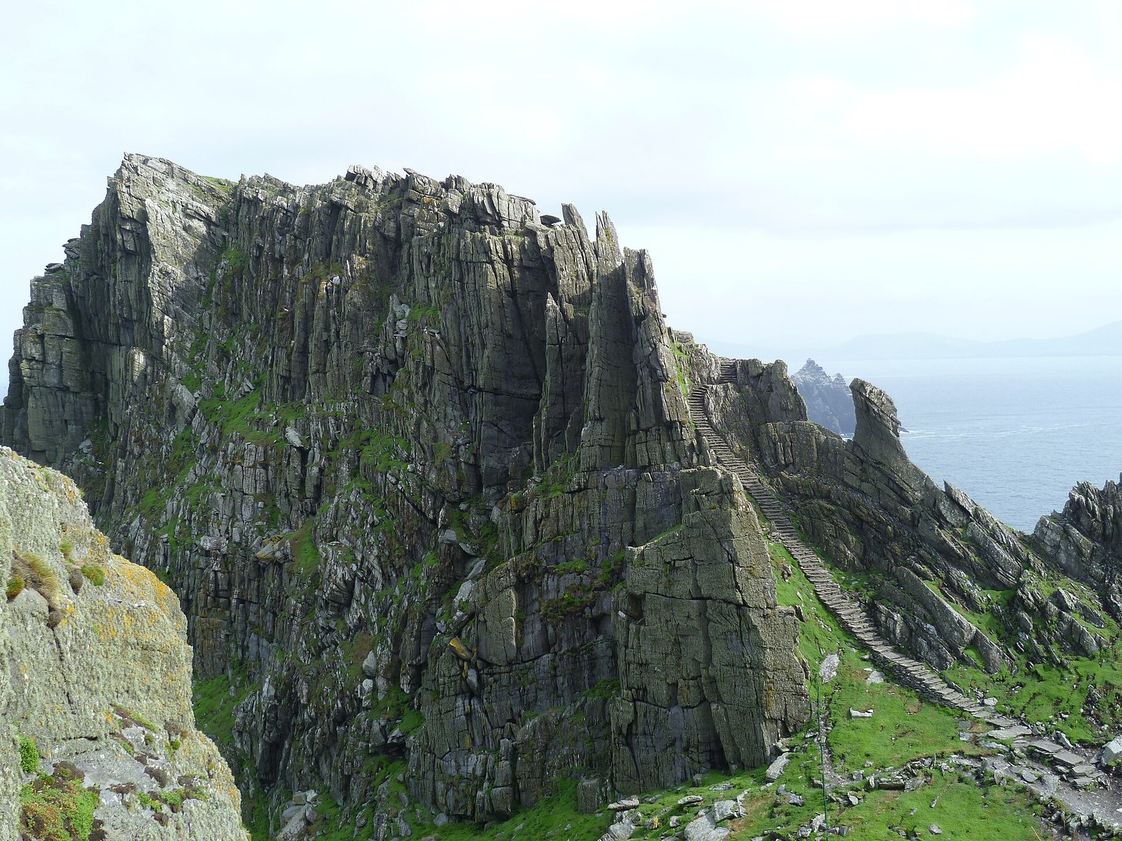 Stone steps climbing between exposed rock faces on Skellig Michael