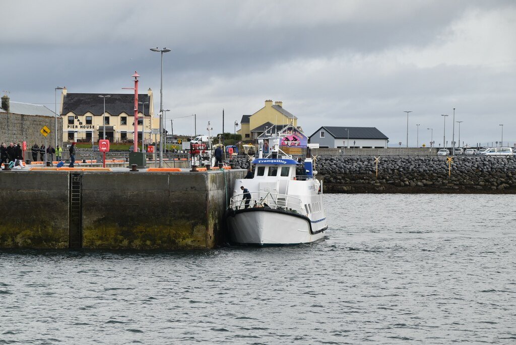 A ferry tied up at Kilronan harbor on Inis Mór