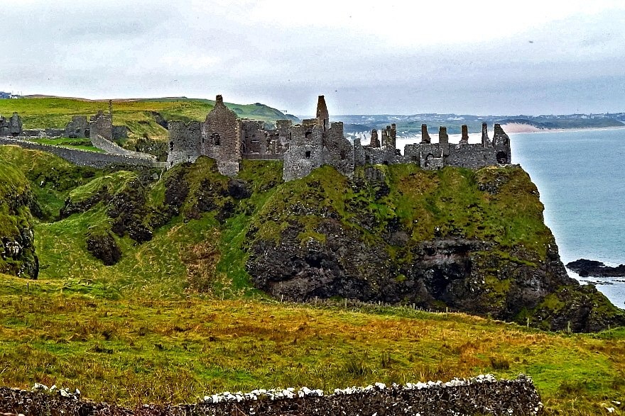 Dunluce Castle on a rocky headland on the Antrim coast