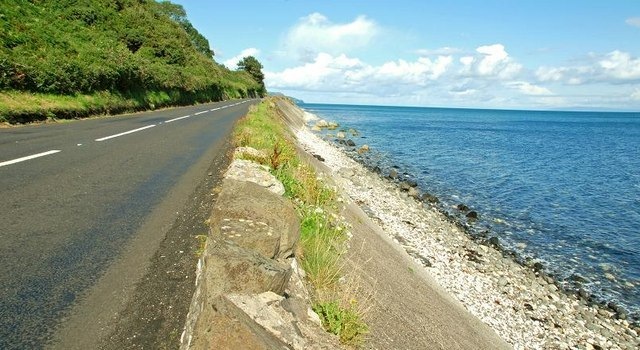 The Antrim Coast Road beside the sea near Drumnagreagh