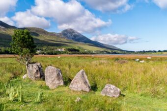 Croagh Patrick above Clew Bay with standing stones in the foreground