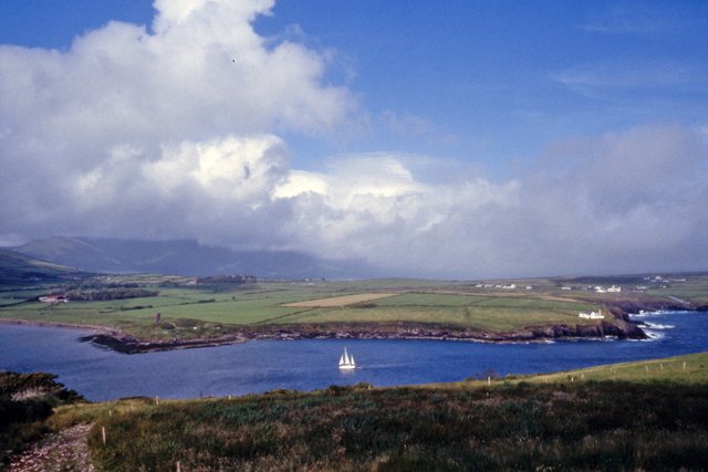 Sailboat at the entrance to Dingle harbor