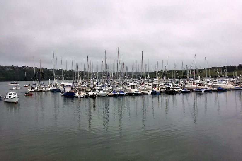 Sailboats moored in Kinsale harbor