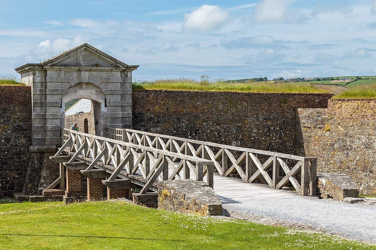 Wooden bridge and stone entrance at Charles Fort