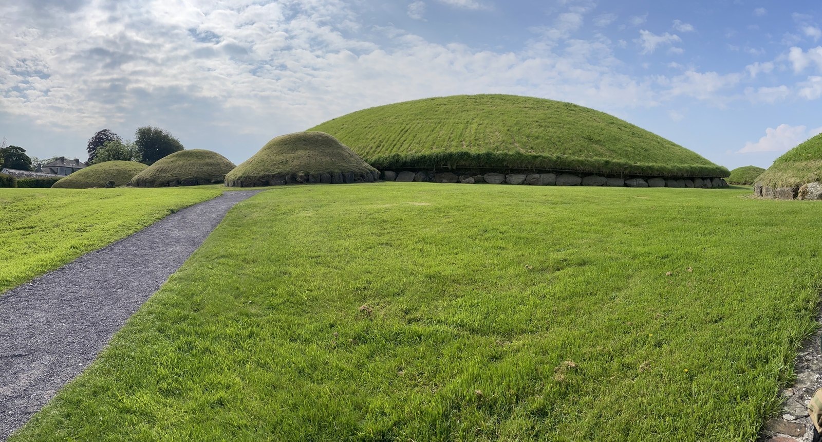 Main mound and smaller passage tombs at Knowth